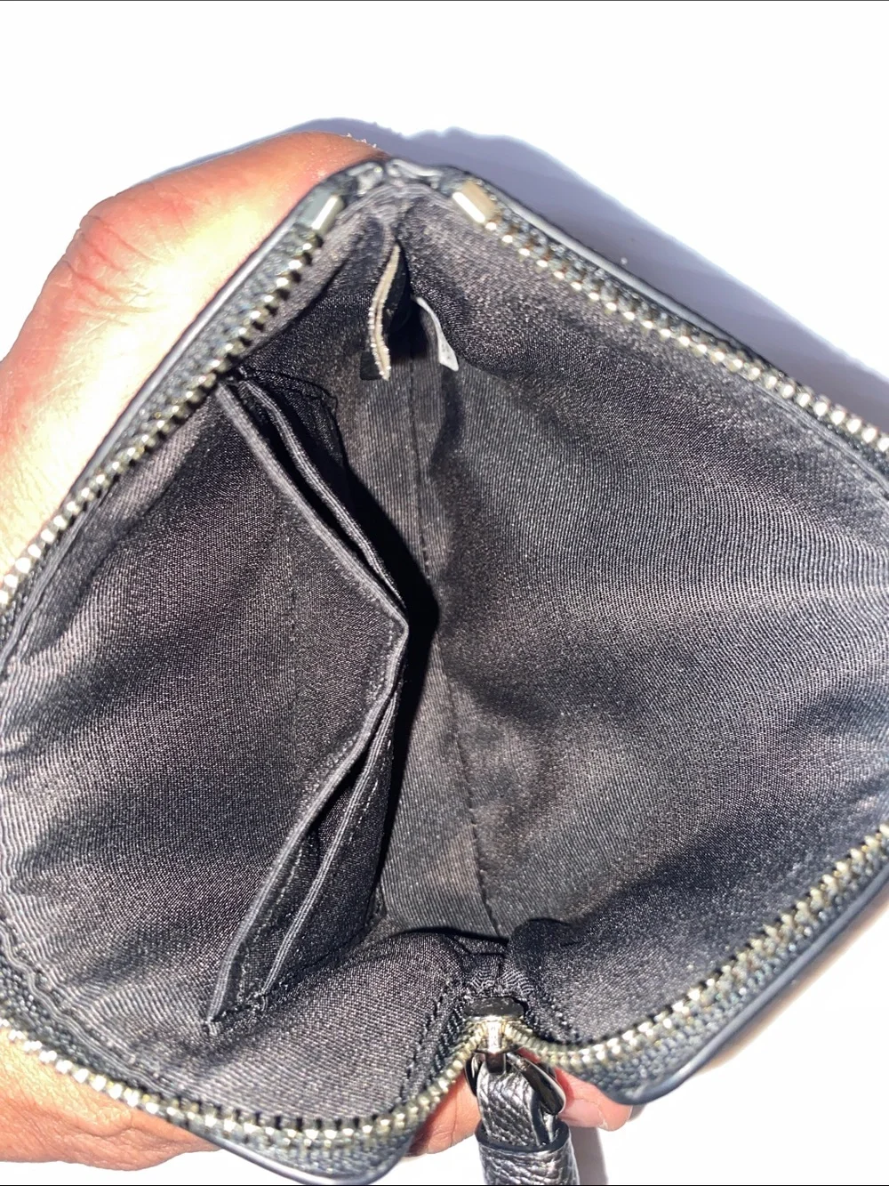Coach Corner Zip Leather Wristlet in Silver and Black. F21070